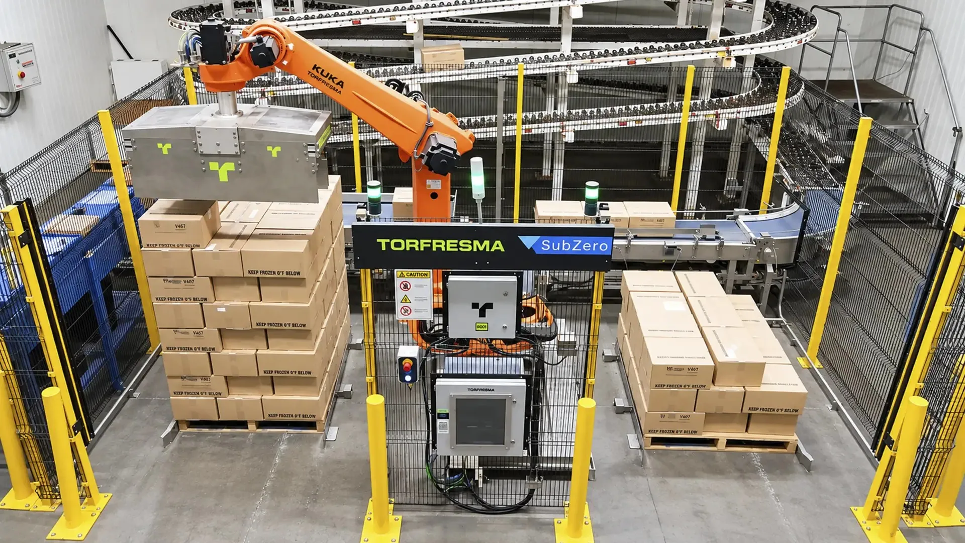 Robotic palletizing cell working in a cold production environment.