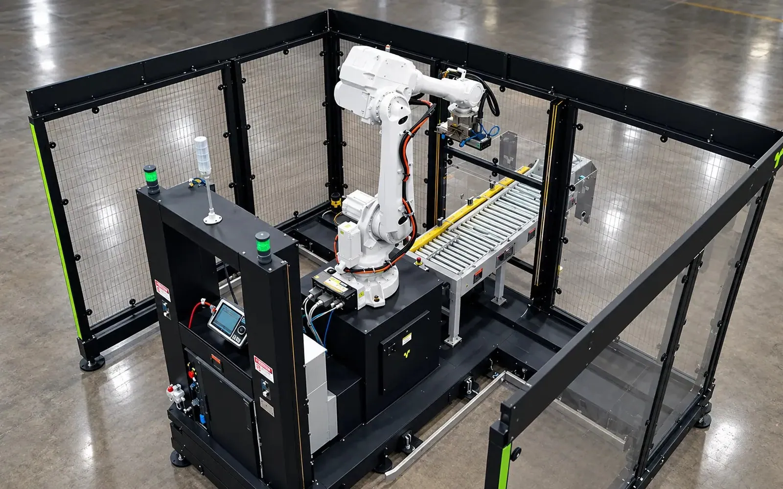 TRFCompact polycarbonate cell, aerial view of the robot, case conveyor and safety fencing.