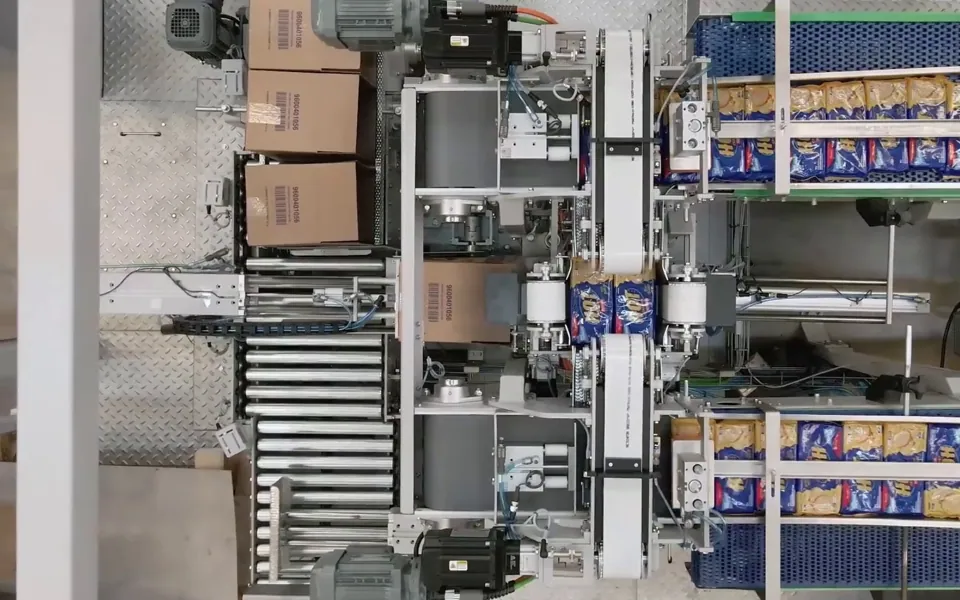 Packages on the TRFDroppack roller infeed