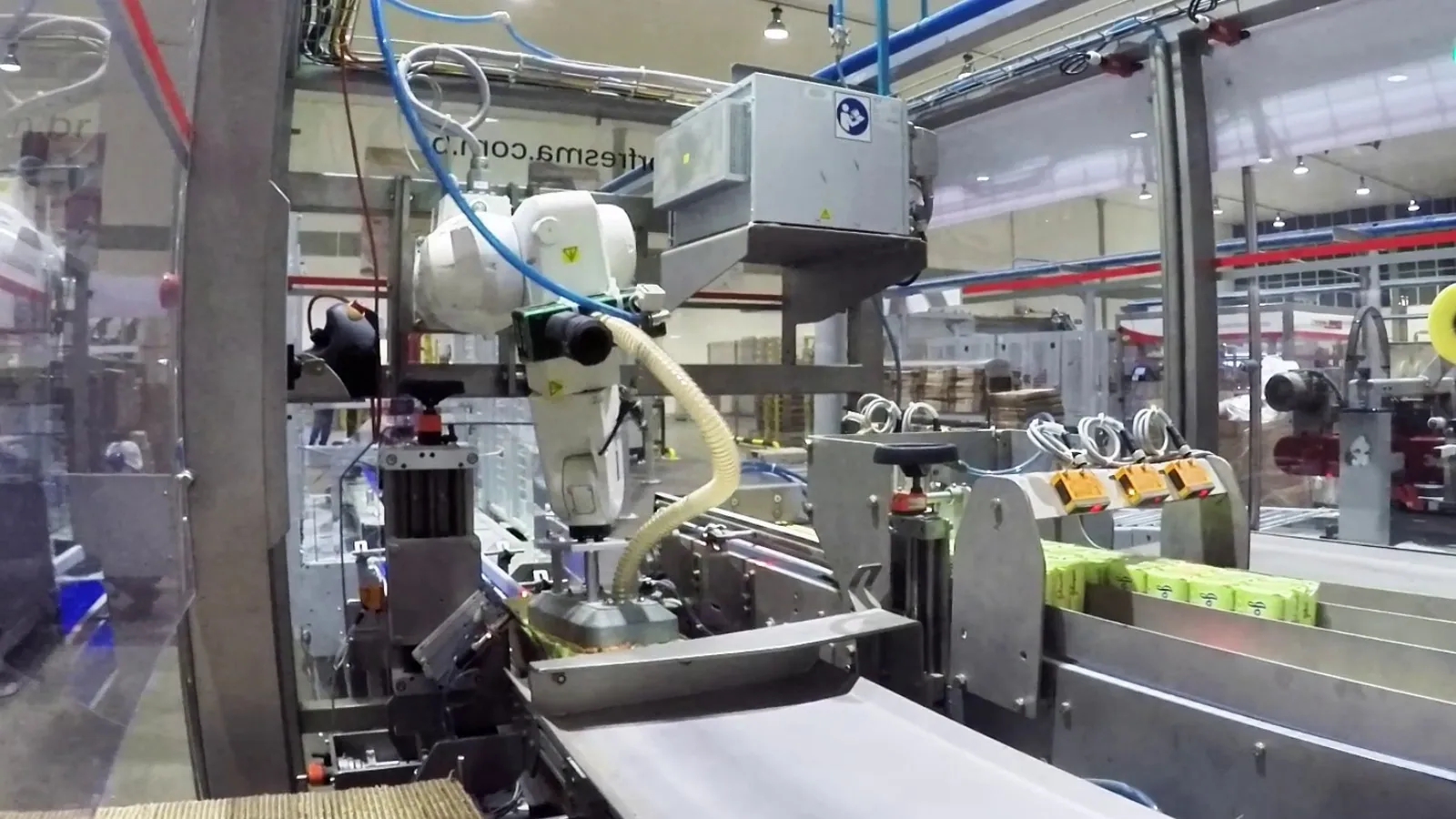 Food processing automation: TRFOnepack robotic case packing seen from above.